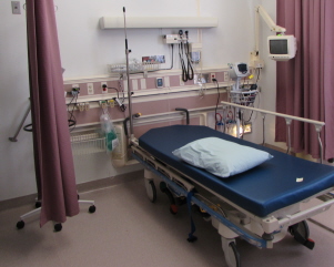 Cardiopulmonary department that is fully equipped with a bed and monitors