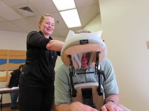 A patient is receiving a massage from a health provider